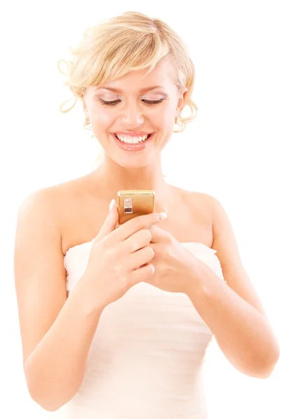 Blond young woman reads message — Stock Photo, Image