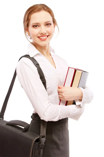 Usměvavá studentka s učebnicemi a portfolia — Stock fotografie