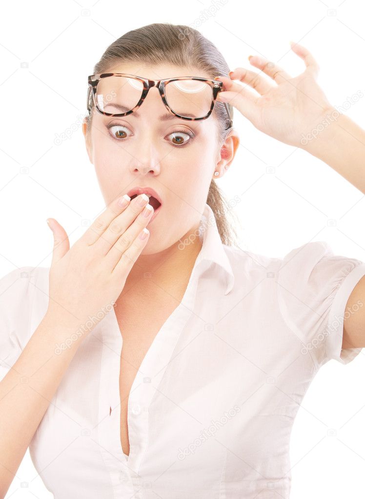 Young woman in glasses is surprised
