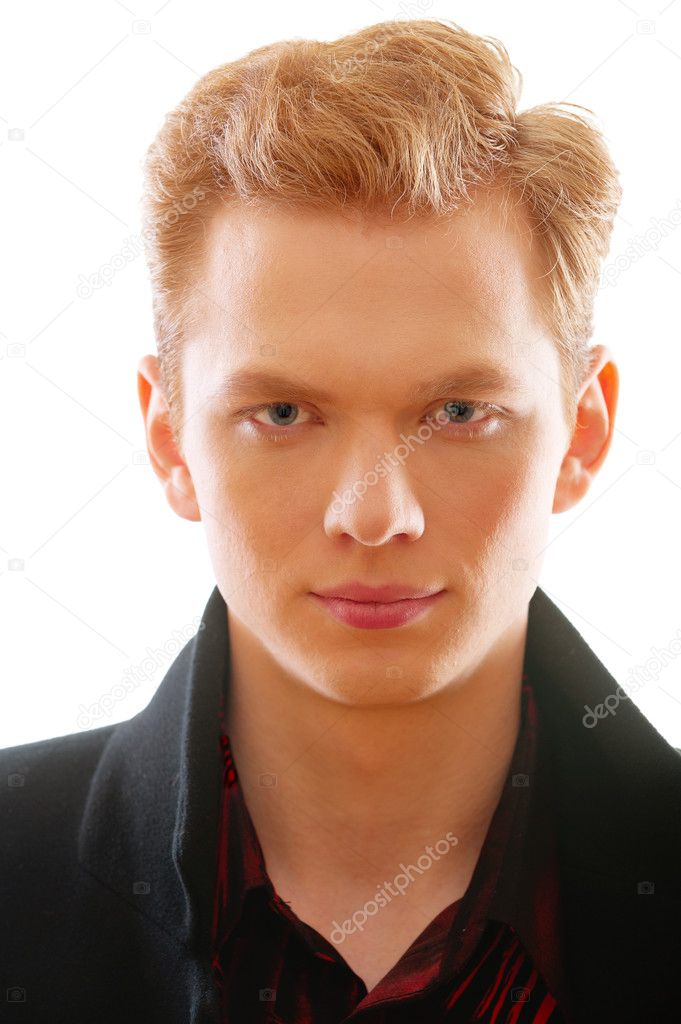 Portrait of young red-haired man close up