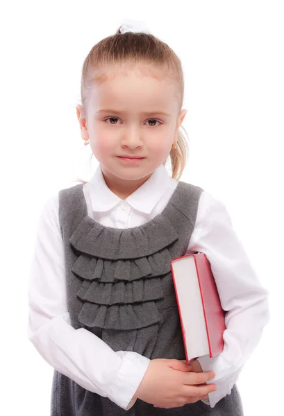 Porträtt av vackra skolflicka med röda bok — Stockfoto