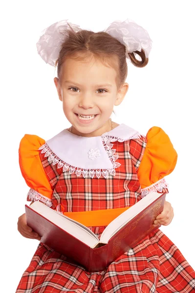 stock image Girl with bows reads book