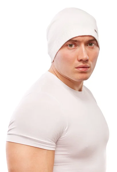 Kraftfull sportsman i vit mössa — Stockfoto
