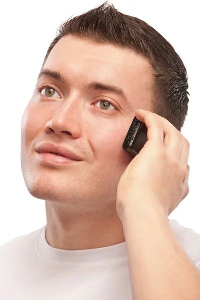 Young man speaks by mobile phone — Stock Photo, Image