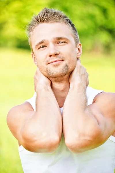 Young man smiles — Stock Photo, Image