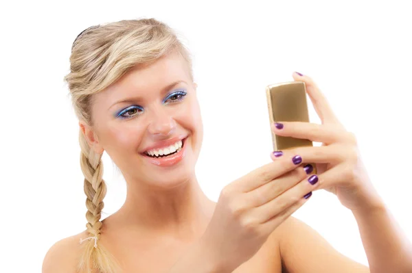 Blond young woman read sms on phone — Stock Photo, Image