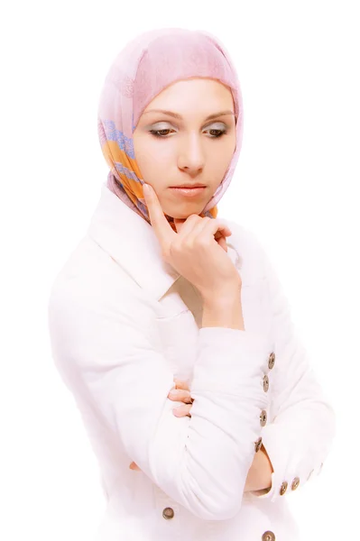 Menina bonita em casaco e lenço de cabeça — Fotografia de Stock