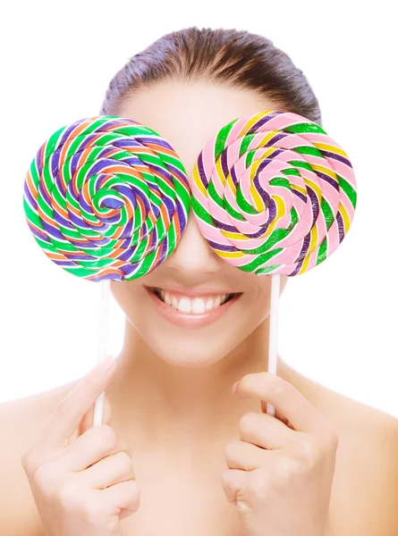 Lovely young woman with two lolipops — Stock Photo, Image