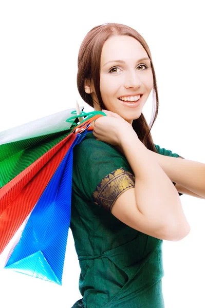 Young beautiful smiling woman with purchases — Stock Photo, Image