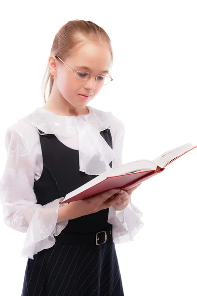 Young smiling schoolgirl read textbook — Stock Photo, Image