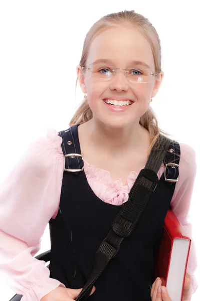 Junge lächelnde Schülerin hält Schulbücher in der Hand — Stockfoto