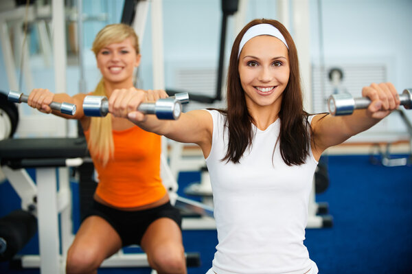 Girls with dumbbells