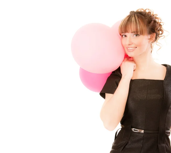 Charmiga leende flicka med ballonger — Stockfoto