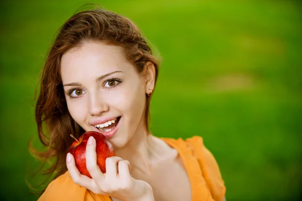 Girl with red apple Stock Photo