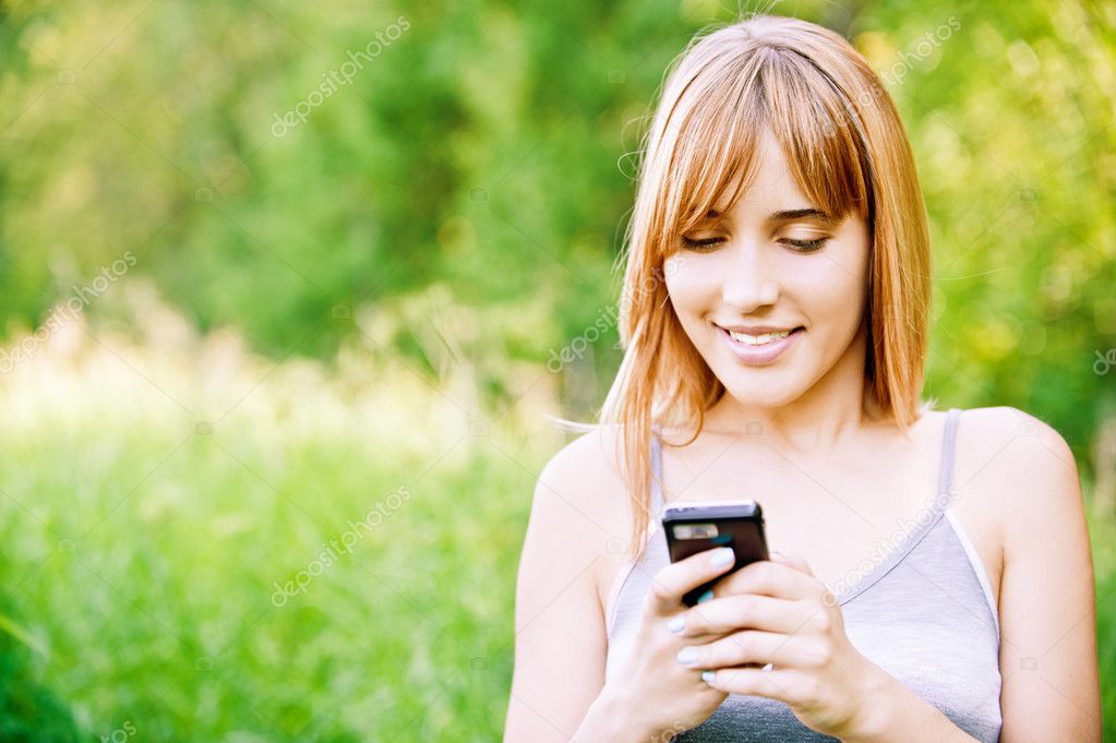 Lovely girl reads sms