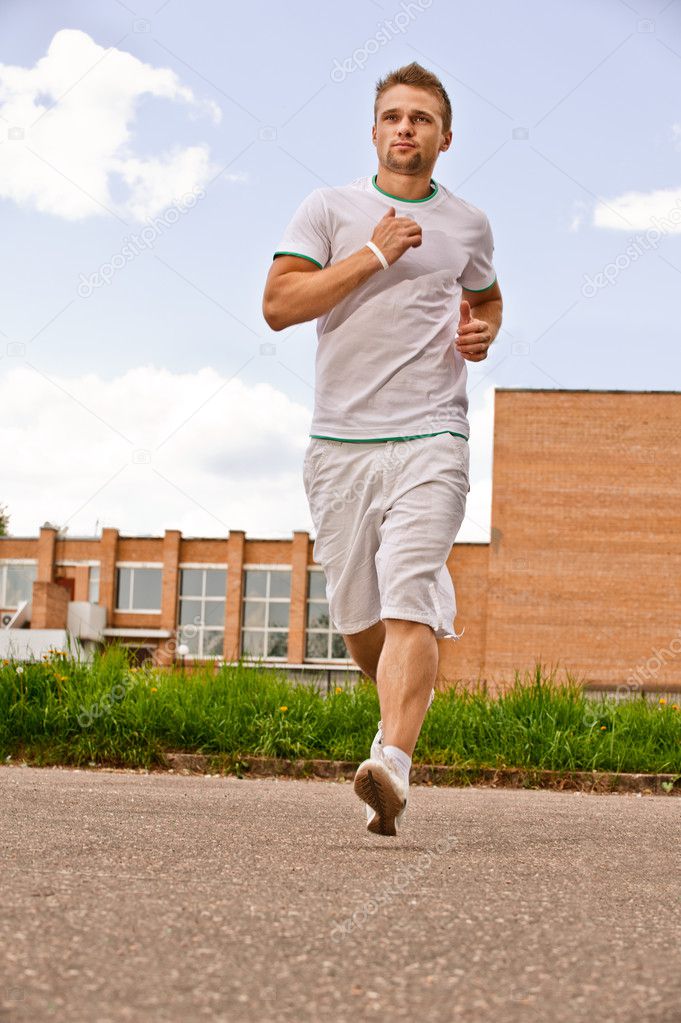 Portrait of sportsman runs