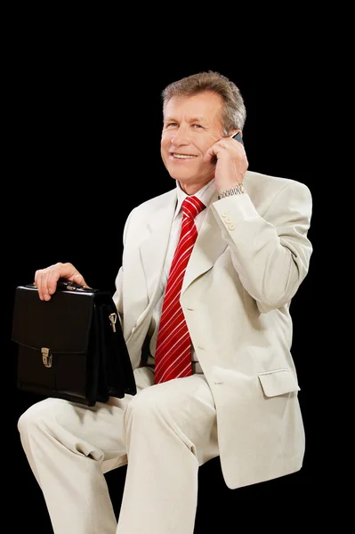 Senior businessman with cellphone — Stock Photo, Image