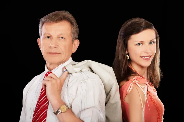 Старший бизнесмен и девушка — стоковое фото