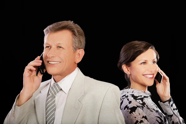 Businesspeople with cellphones — Stock Photo, Image