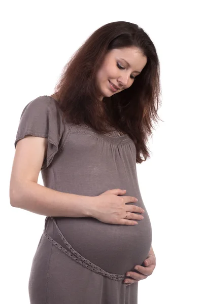 Mulher grávida vestindo um vestido — Fotografia de Stock