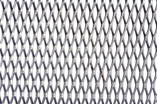 Punched metal on white — Stock Photo, Image