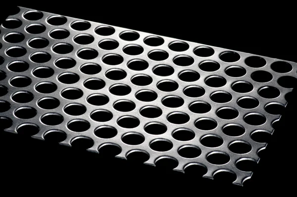Punched metal isolated — Stock Photo, Image