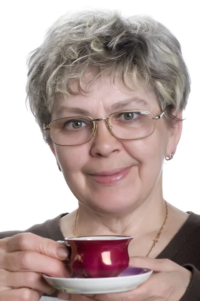 Kobieta z filiżanką herbaty — Zdjęcie stockowe
