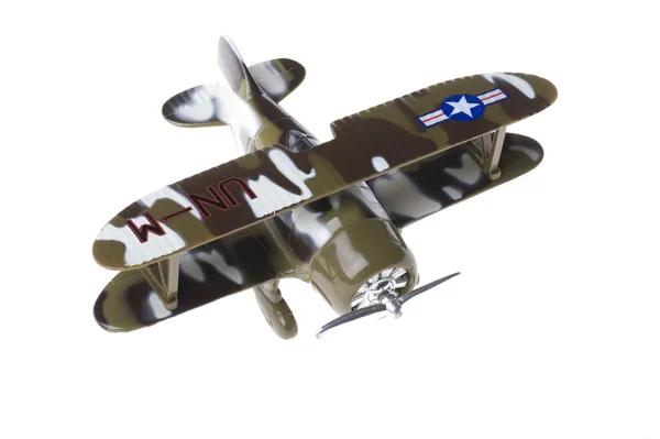 Hračka vojenské letadlo na bílém pozadí — Stock fotografie