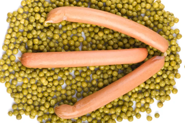 Green peas with frankfurter on white — Stock Photo, Image