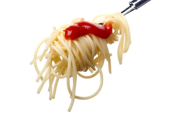Spaghetti on fork with ketchup — Stock Photo, Image