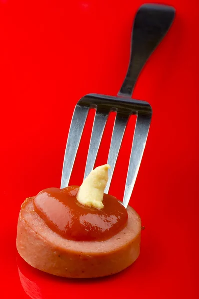 Frankfurter s kečupem — Stock fotografie