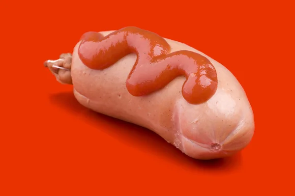 Salsicha em fundo vermelho — Fotografia de Stock