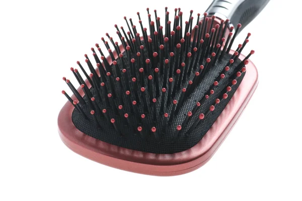 Escova de cabelo perto — Fotografia de Stock