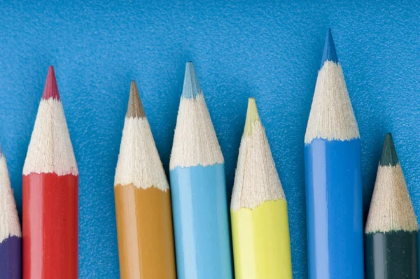 Crayon on blue close up — Stock Photo, Image