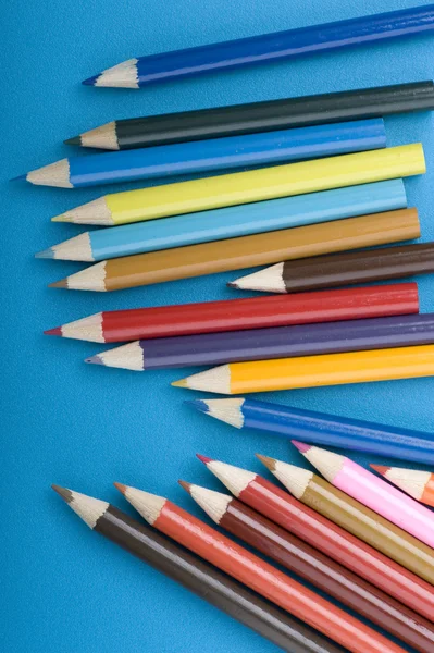 Crayon on blue macro — Stock Photo, Image