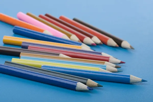 Crayon on blue — Stock Photo, Image