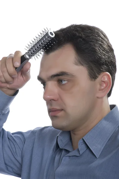 Men with comb close up — Stock Photo, Image