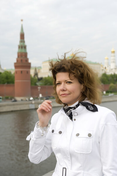 Russian woman and Moscow kremlin