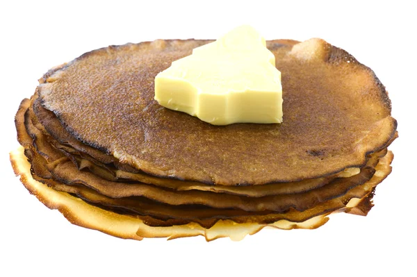 Pancake con burro su bianco — Foto Stock