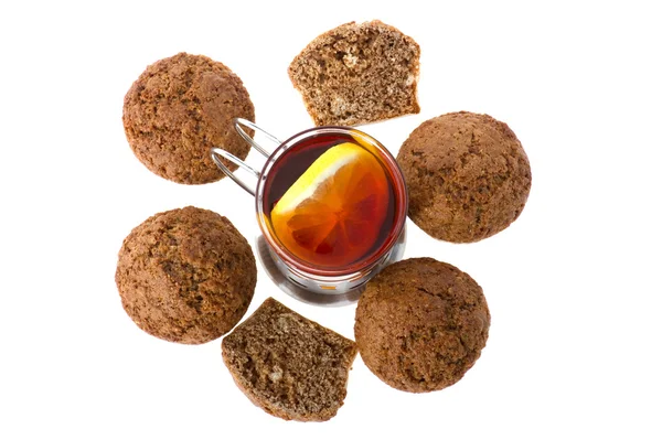Muffin with tea on white — Stock Photo, Image