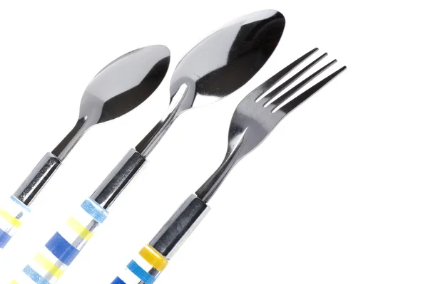 Keuken gebruiksvoorwerp lepel met vork close-up — Stockfoto