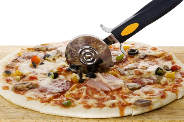 Pizza with knife close up on white — Stock Photo, Image