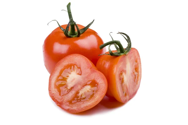 Cutting tomato on white — Stock Photo, Image
