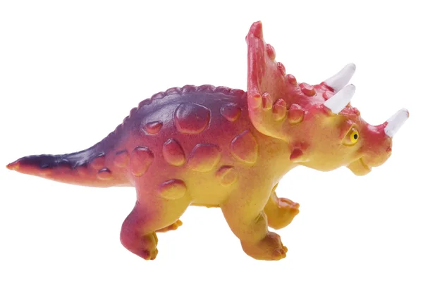 Игрушка динозавра на белом — стоковое фото