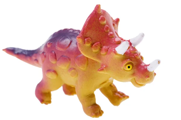 Leksak dinosaurie på vit bakgrund — Stockfoto