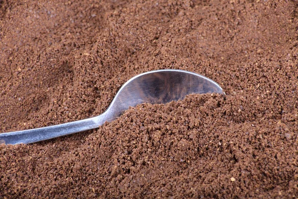 stock image Milled coffee and teaspoon