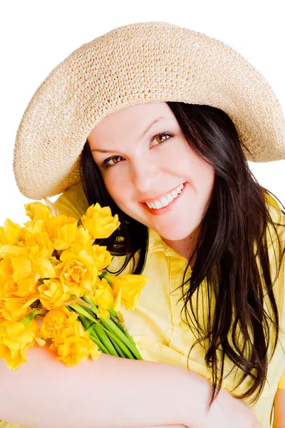 Våren kvinna med blommor — Stockfoto