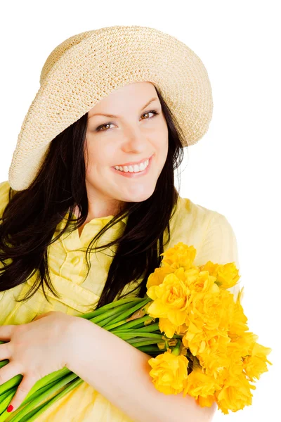 Spring woman holding flowers Stock Photo