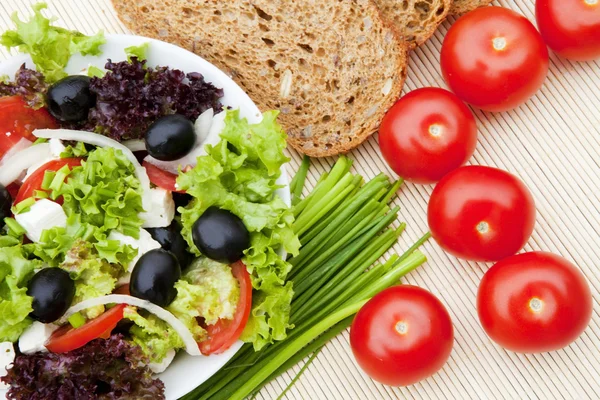 Greek salad on plate — Stock Photo, Image