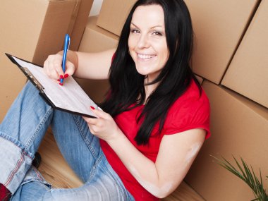 Woman moving to new house clipart